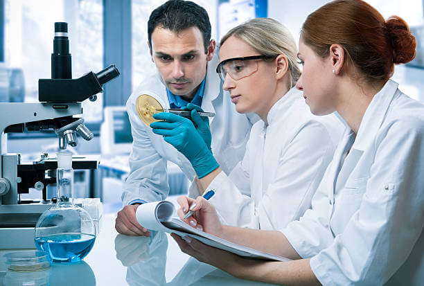 group of scientists working at the laboratory.