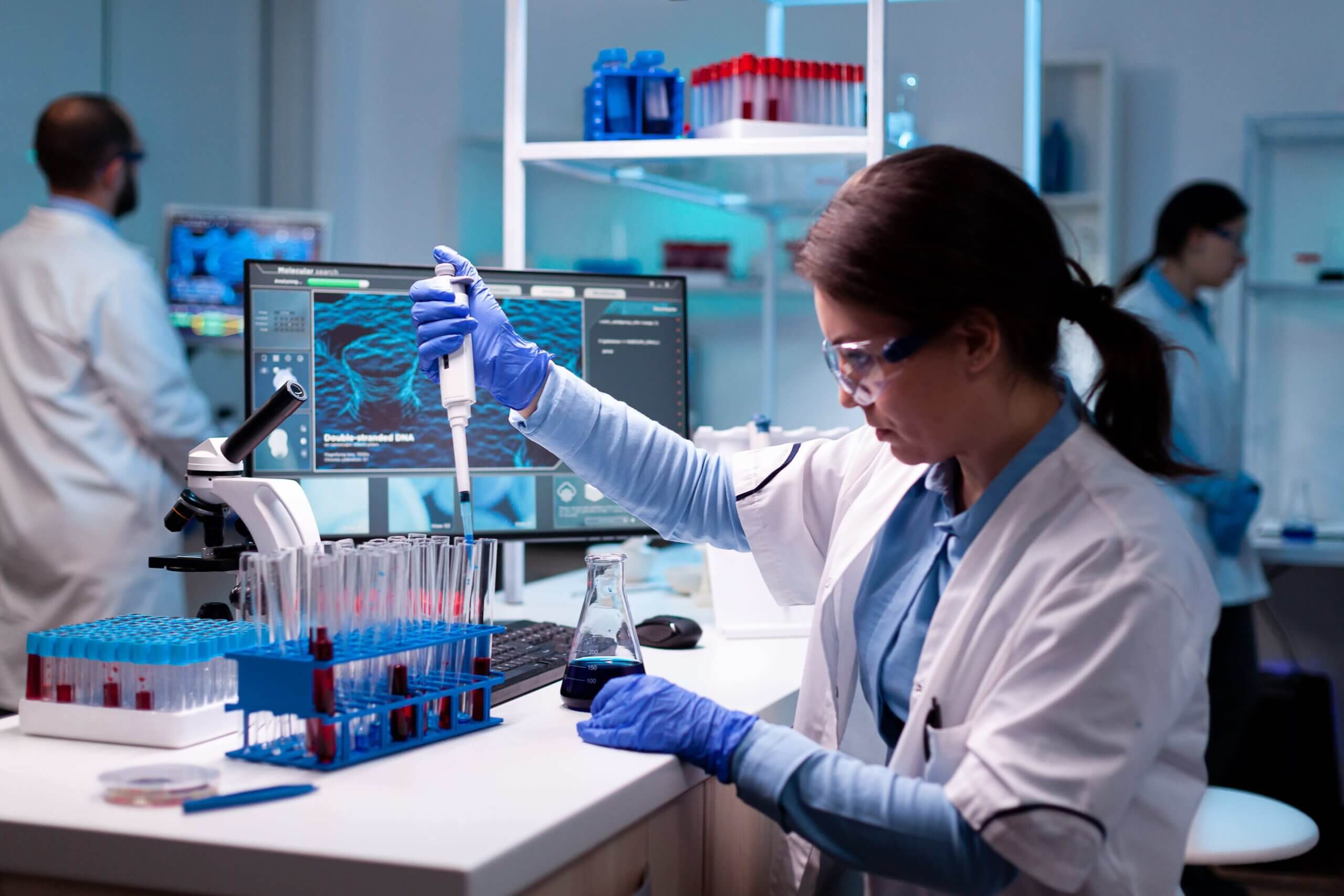medical-engineer-scientist-uses-micropipette-pipette-taking-sample-from-test-tube-min